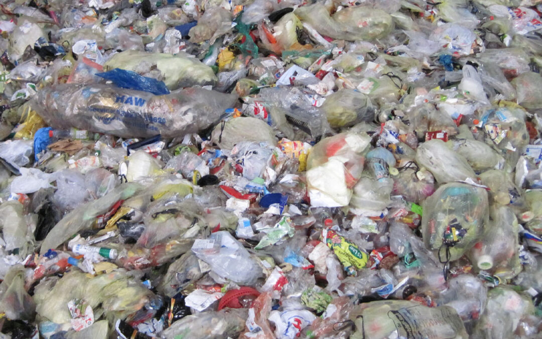 Post-consumer plastic bag opening